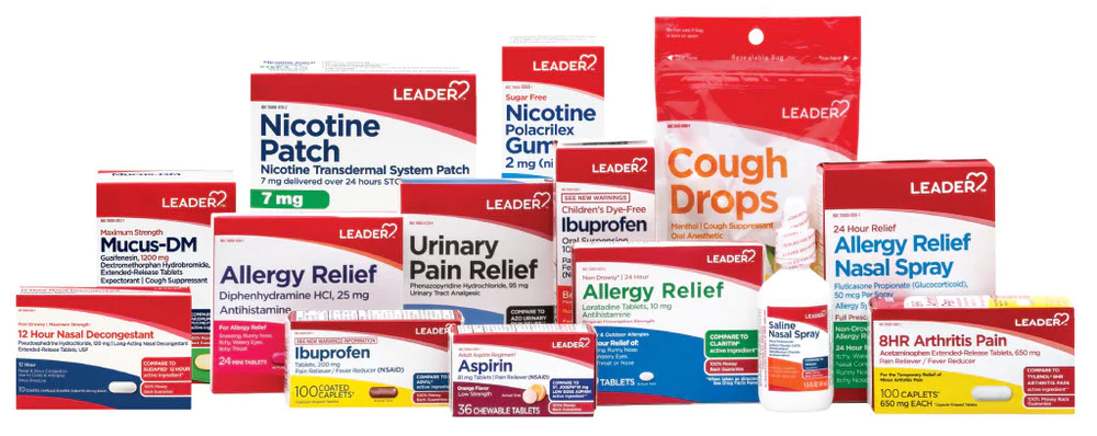 Assortment of LEADER brand medicine boxes, including nicotine patches, cough drops, and allergy relief.