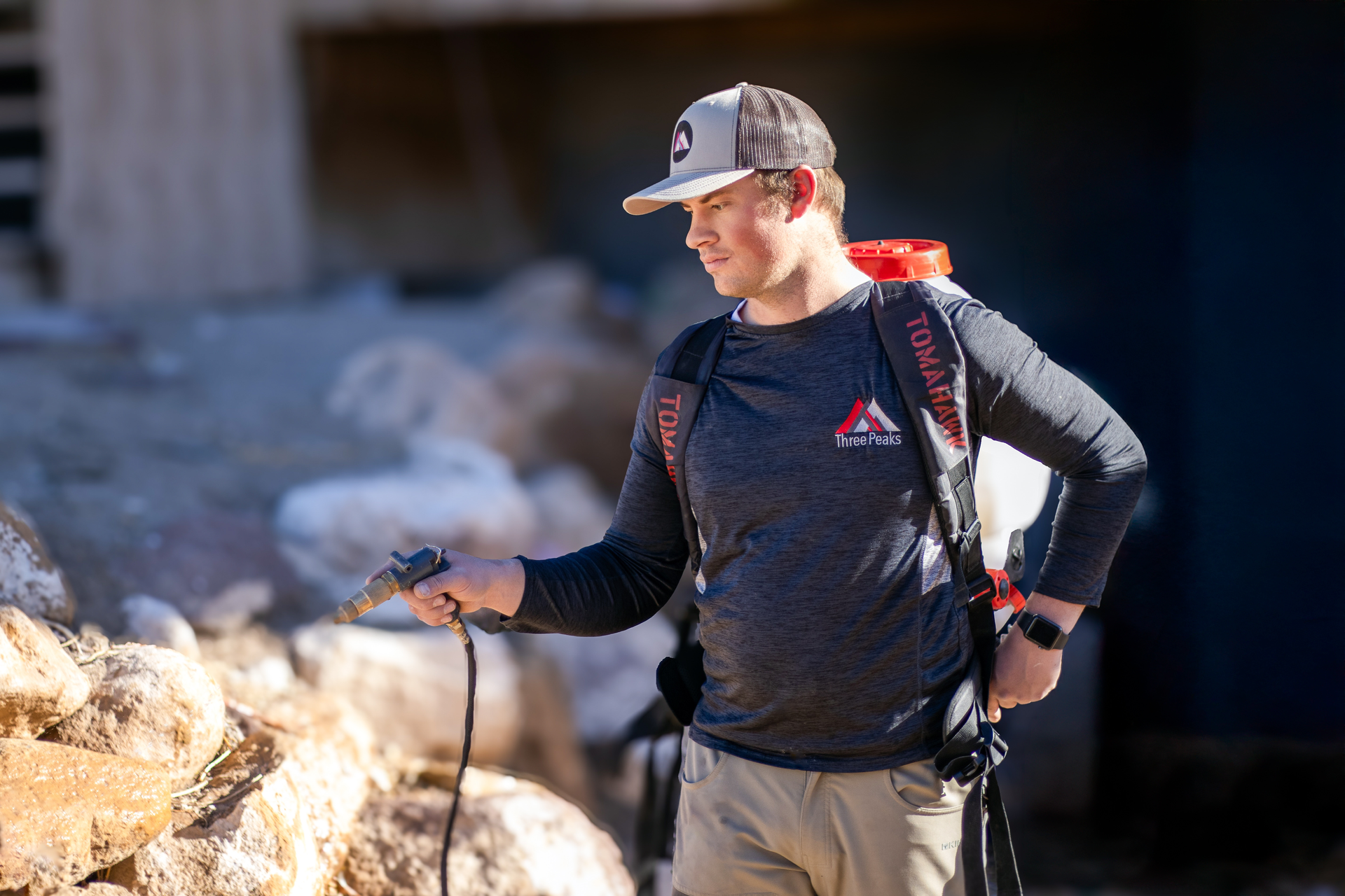 Three Peaks Pest Control technician servicing a Cedar City home. 