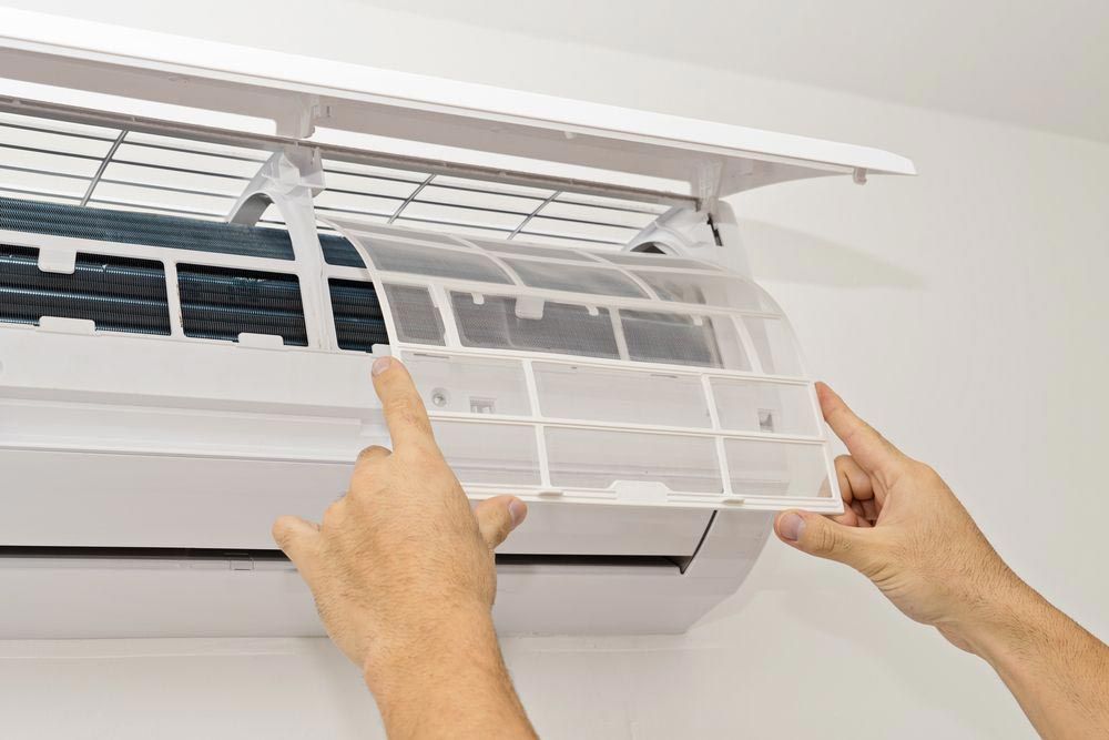 Changing Filter On An Air Conditioning Unit