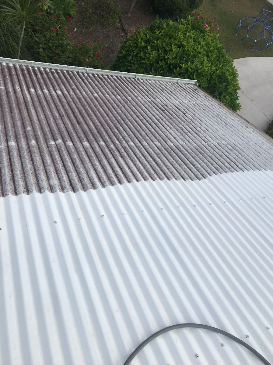 Corrugated Roof Part Way Through Pressure Cleaning — Derek's Dirty Deeds In Booral, QLD