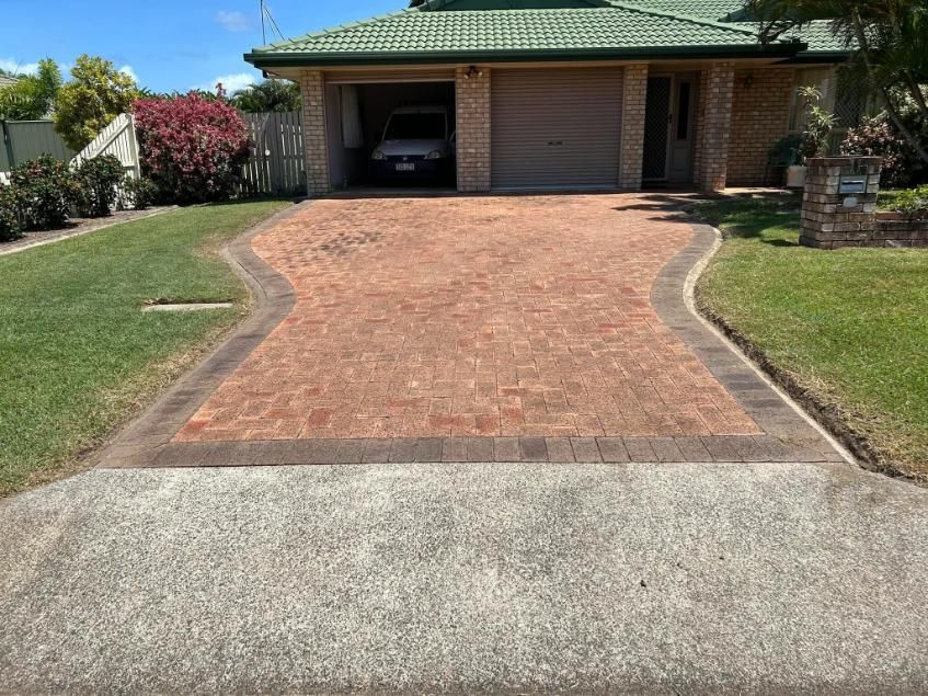 A Dusty Driveway in Front of a House — Derek's Dirty Deeds In Childers, QLD