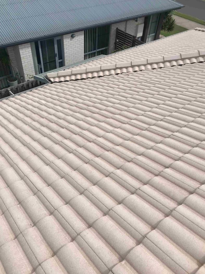 A Close Up of a Tiled Roof of a House — Derek's Dirty Deeds In Burrum Heads, QLD