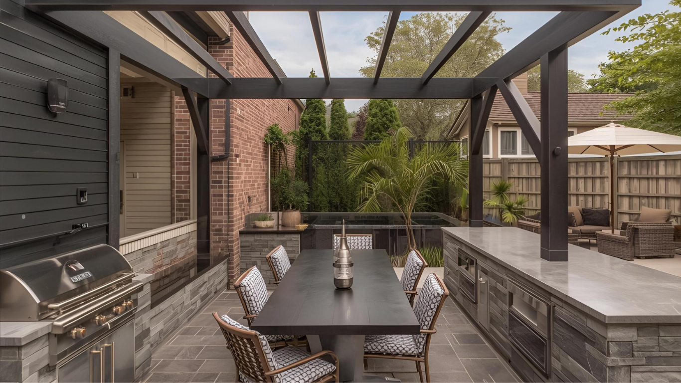 Outdoor dining space with grill, table, chairs, and pergola.