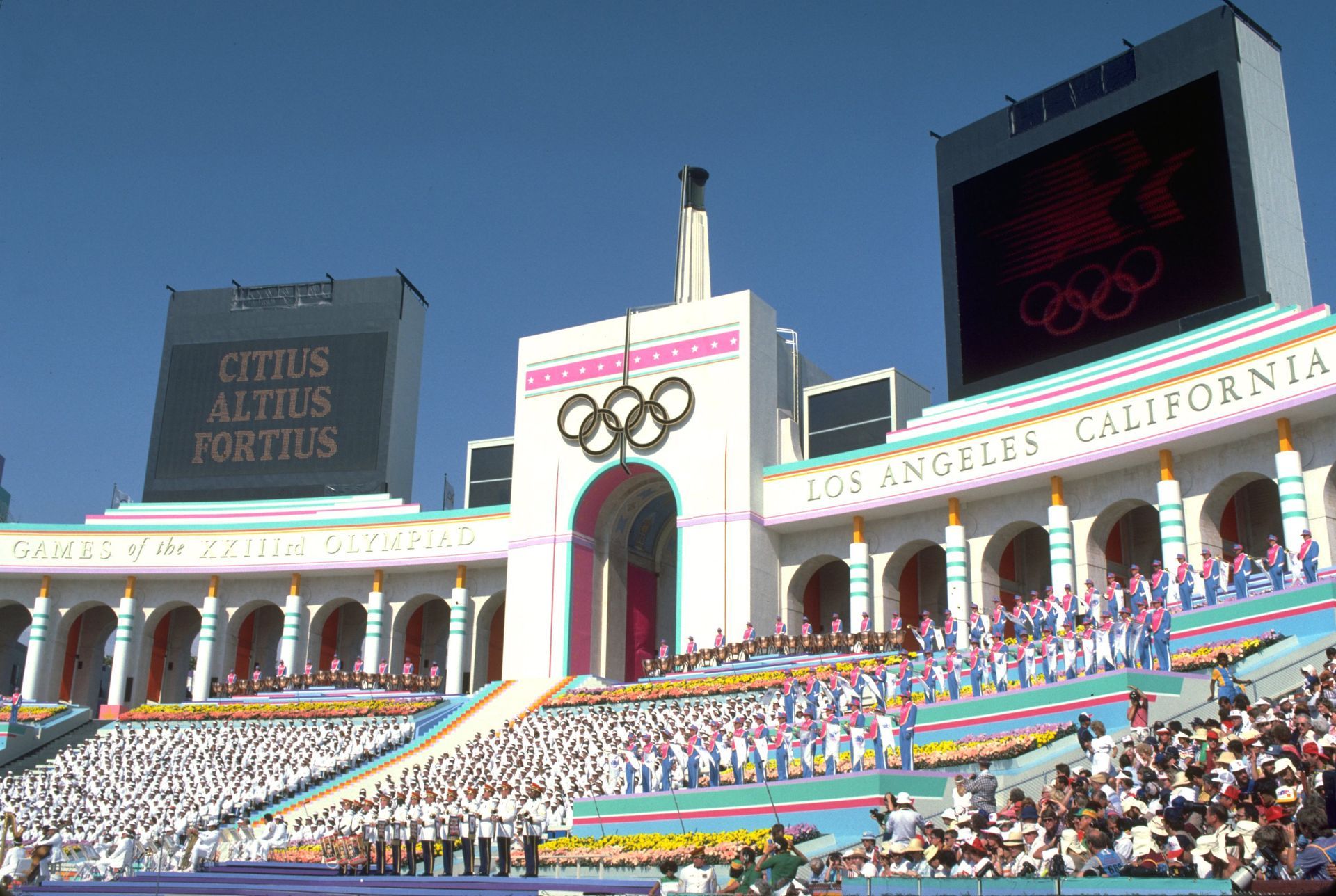 Los Angeles Memorial Coliseum, filled with people, during the 1984 Olympics opening ceremony.