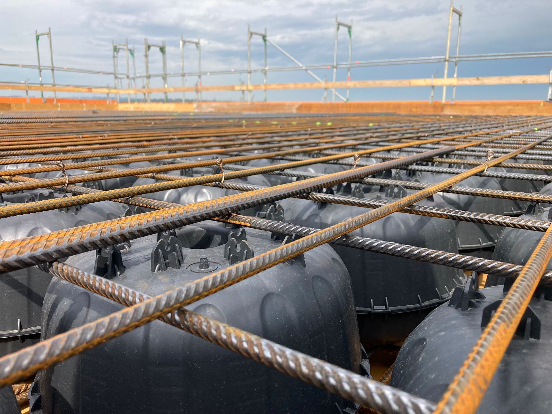 Biaxial voided slabs