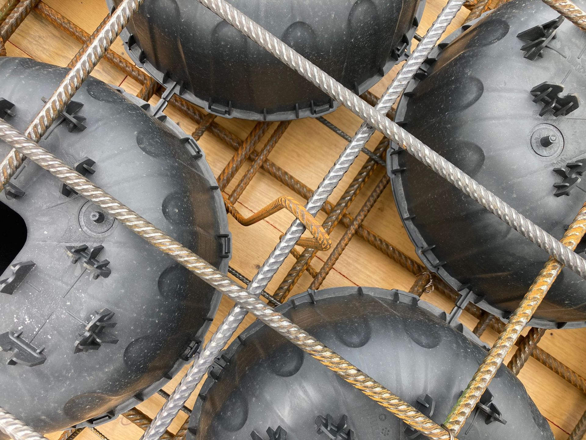 Biaxial voided slabs