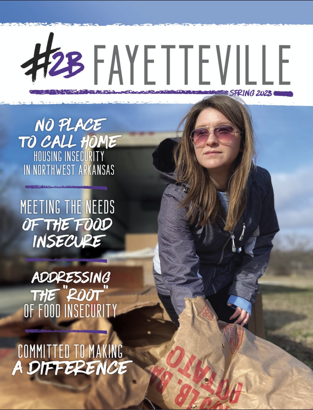 a woman is holding a bag of food on the cover of a magazine .