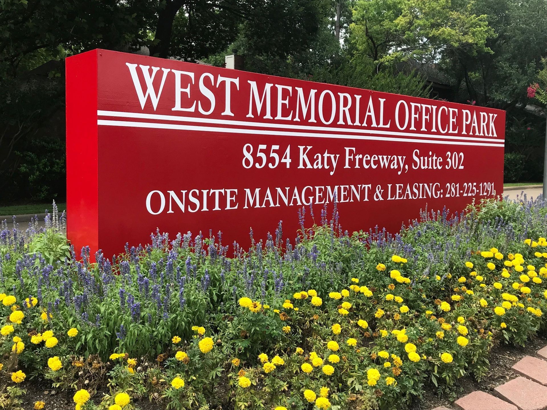 Click on the image to download a PDF of the local amenities. An aerial view of a city with a lot of buildings and roads.