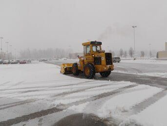 Pushing Snow with Loader — Highland, IN — Allen Landscape in Highland, LLC