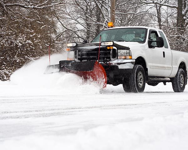 Snow Plowing the Road — Highland, IN — Allen Landscape in Highland, LLC