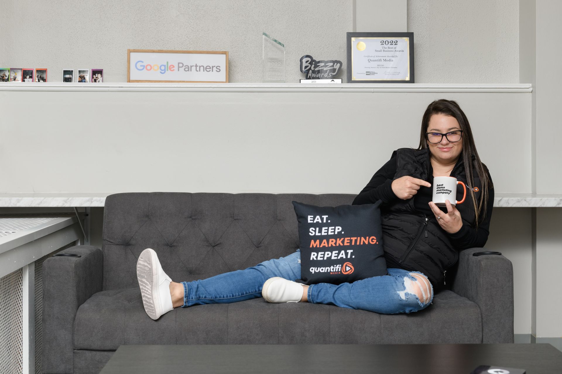 Courtney Quaresimo showing off the Best Marketing mug