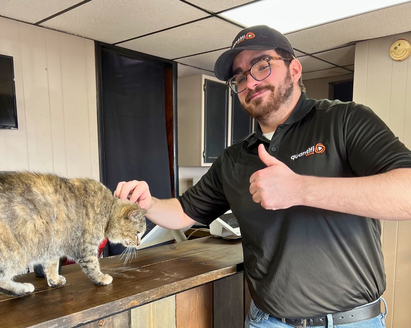 Trevor petting a cat