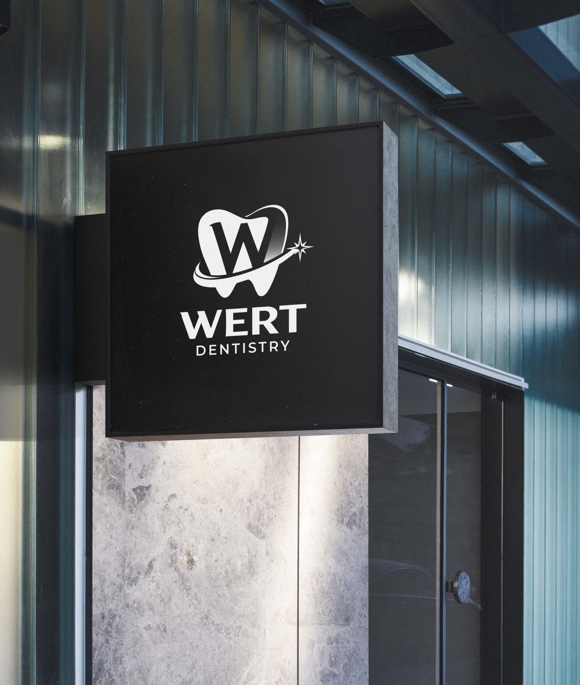 A close up of a moto medic logo on a gray surface.