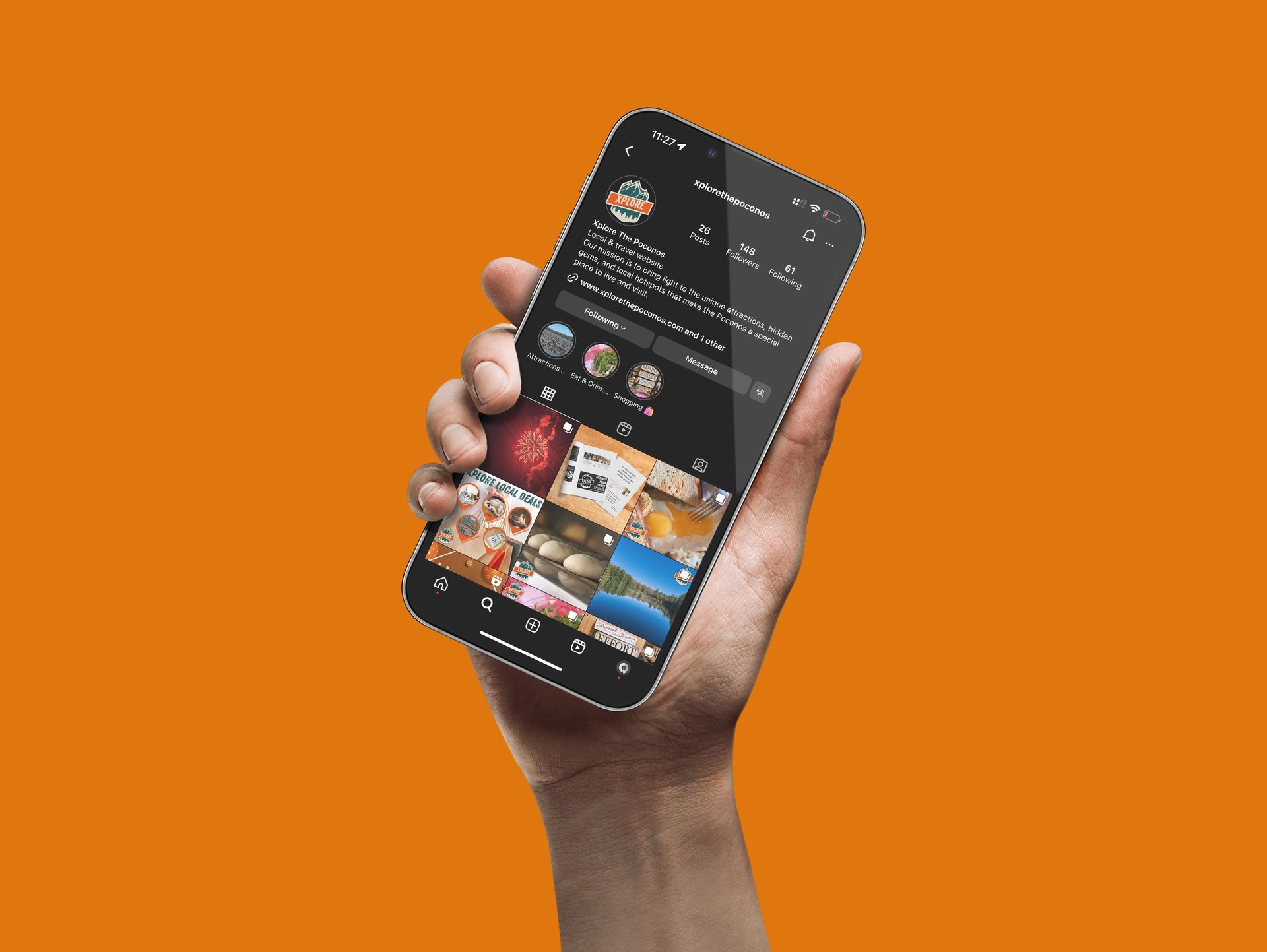 A computer monitor is sitting on a desk next to a keyboard.