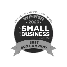 Award badge: Winner "Best SEO Company" 2023. Black circle with text and ribbon.