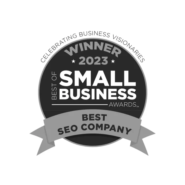 Award badge: Winner "Best SEO Company" 2023. Black circle with text and ribbon.