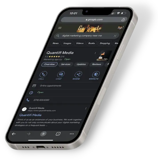 Smartphone displaying a Google search for a digital marketing company; search results highlight Quantifi Media.