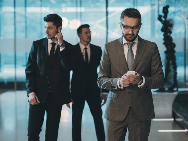 Handsome Businessman in Glasses — San Marcos, CA — Wyatt & Associates Protection Division