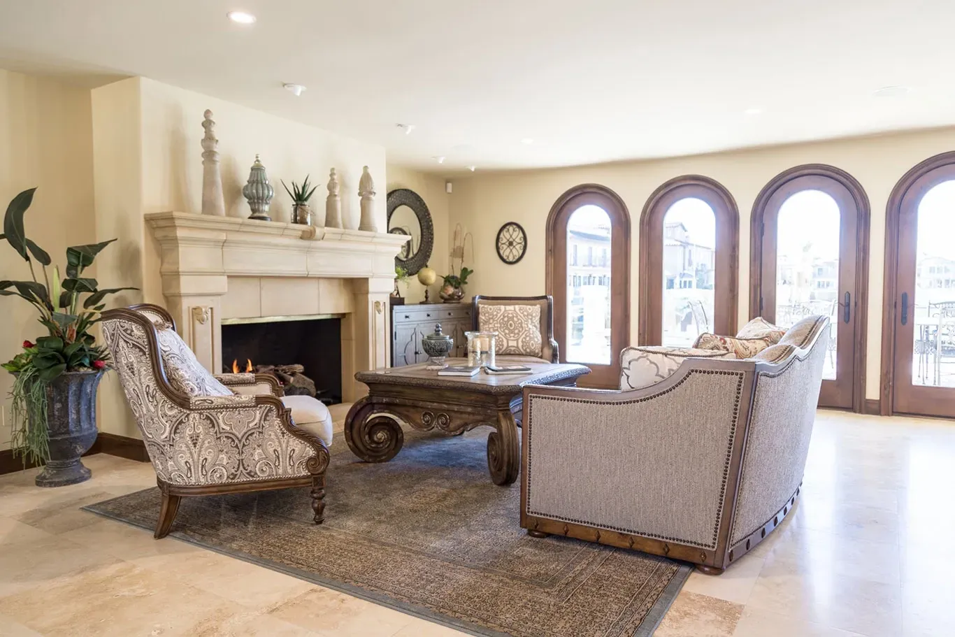 A living room filled with furniture and a fireplace.