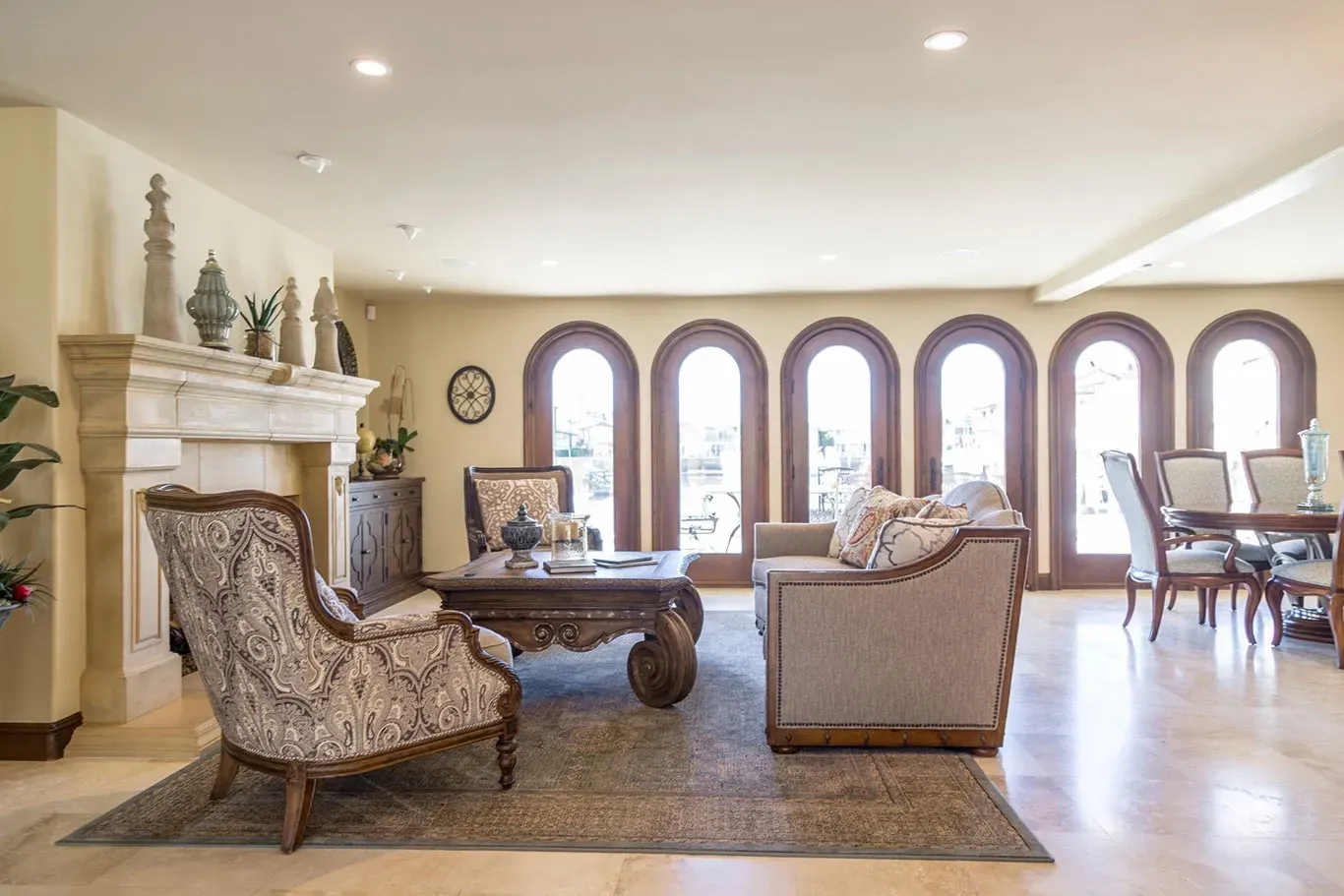 A living room filled with furniture and a fireplace.