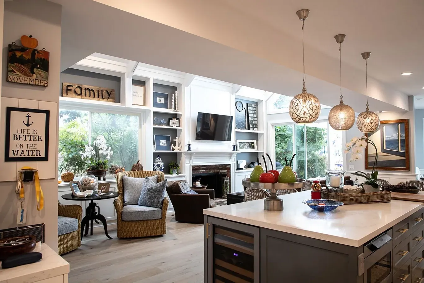 A kitchen with a large island in the middle of the room.