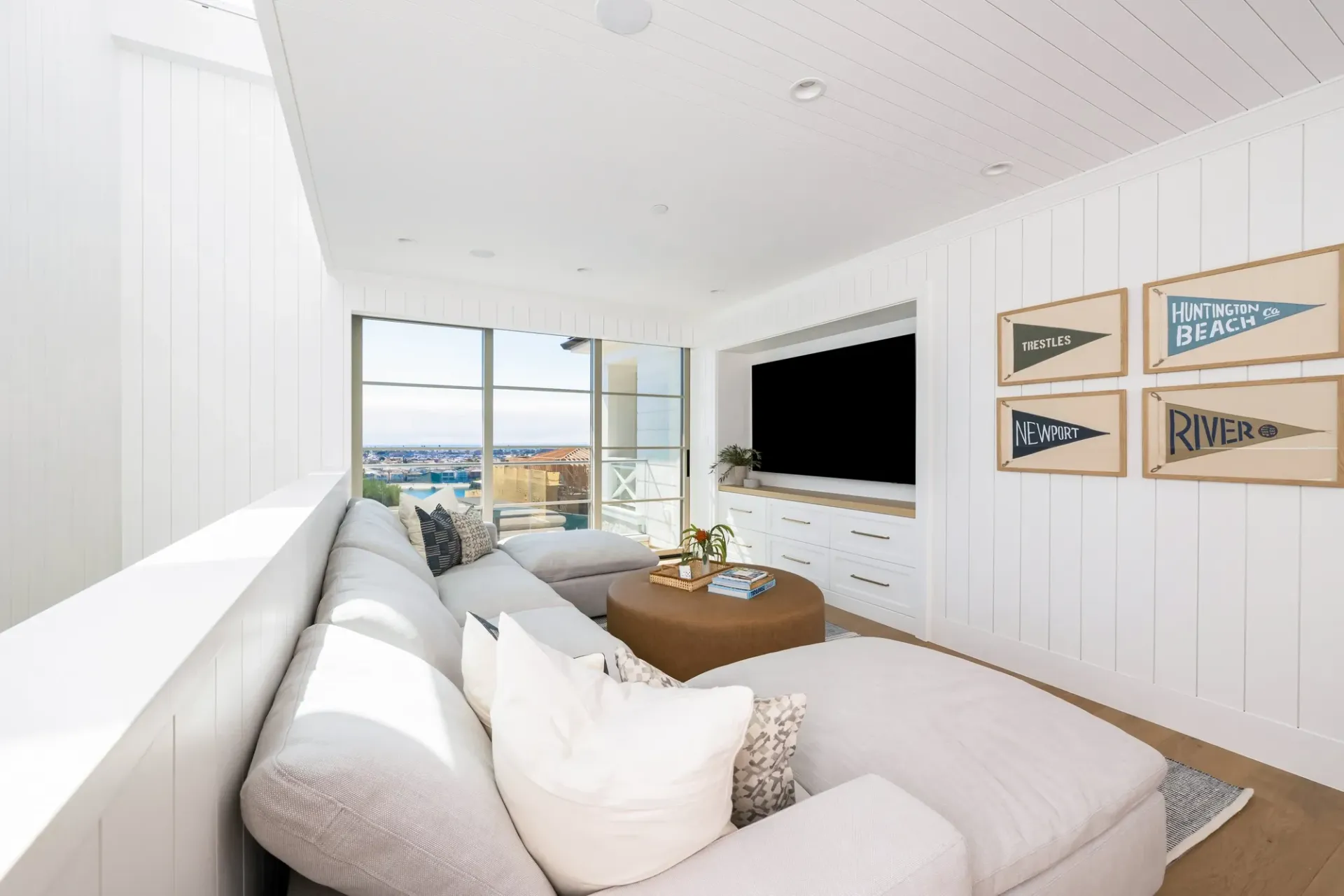 A living room with a couch and a flat screen tv
