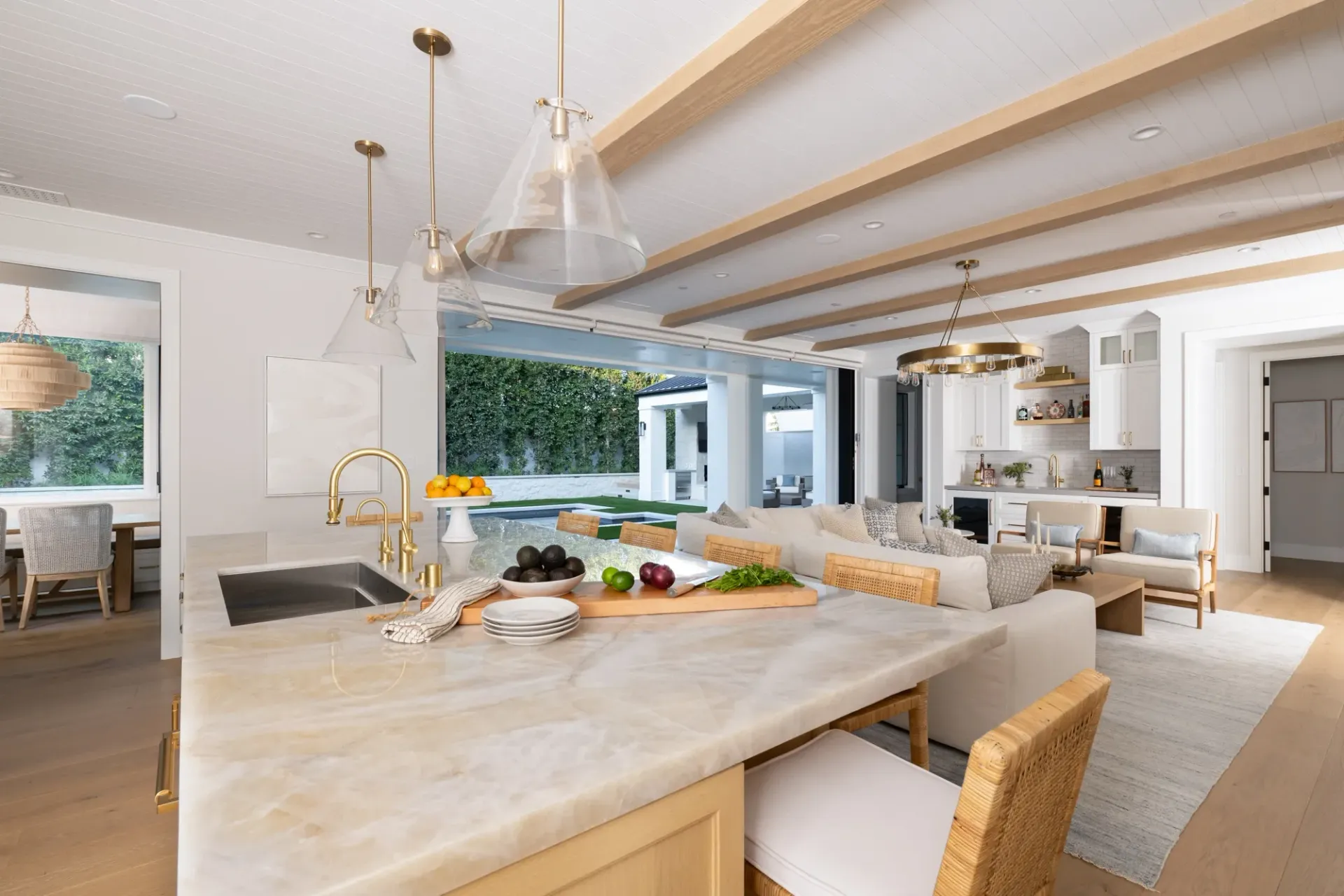 A kitchen with a large island in the middle of the room.