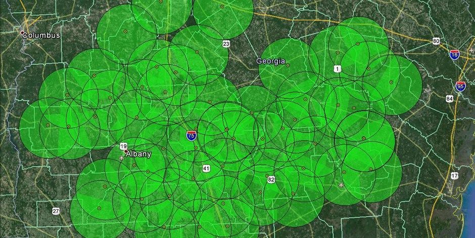 A map of the united states with green circles on it.