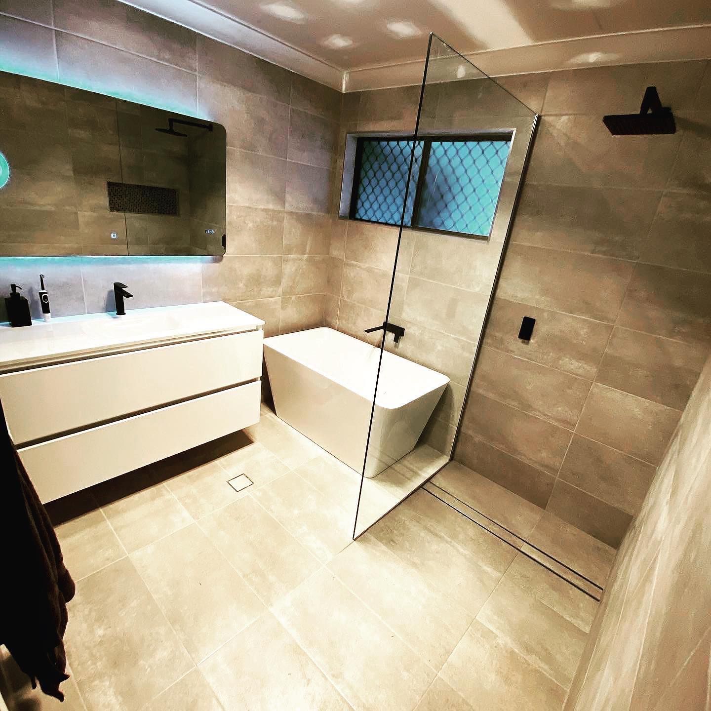 Modern Bathroom With Shower - Laundry Room With Washing Machine - Laundry & Bathroom Renovations in Newcastle, NSW