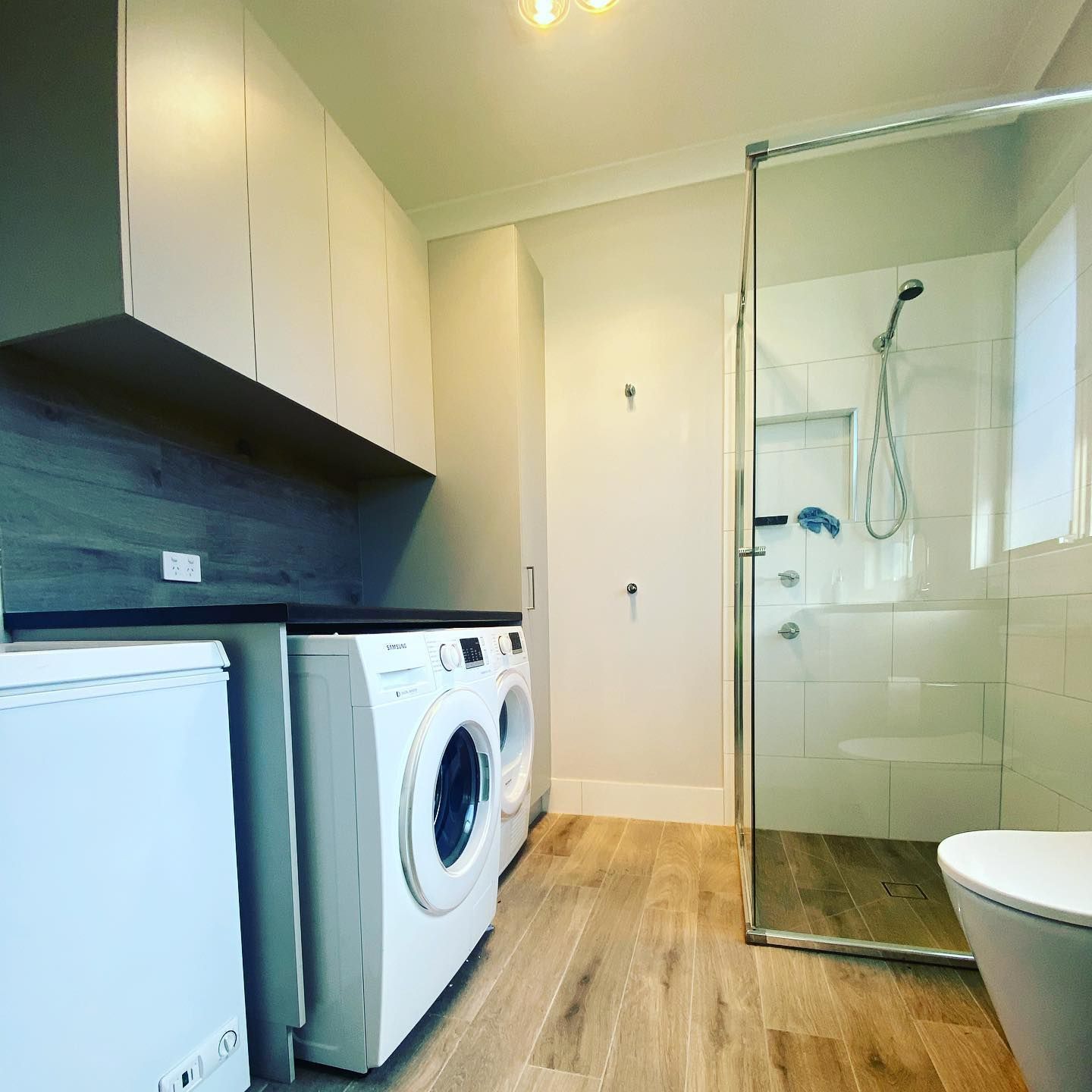 Laundry Room With Washing Machine - Laundry & Bathroom Renovations in Newcastle, NSW