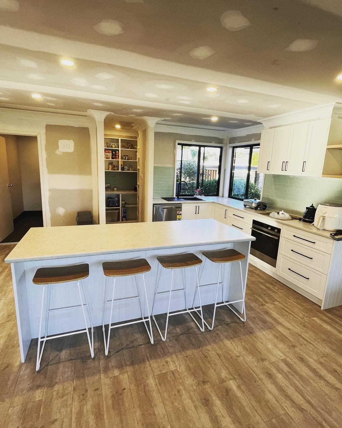 Modern Kitchen With Low Lighting - Licensed Builder in Newcastle, NSW