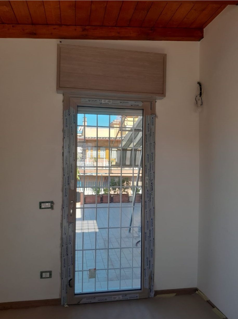 grata di sicurezza e infisso in PVC