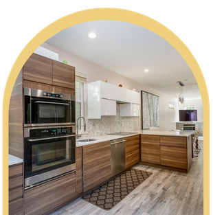 A kitchen with wooden cabinets and stainless steel appliances