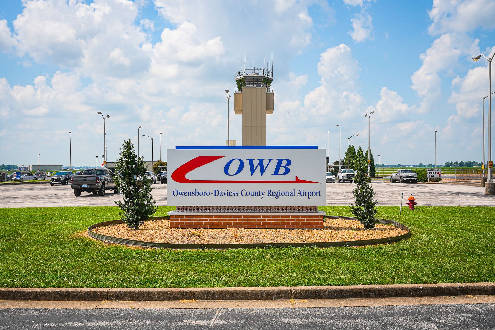 A white sign that says owb on it