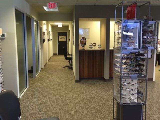 A hallway with an exit sign above it