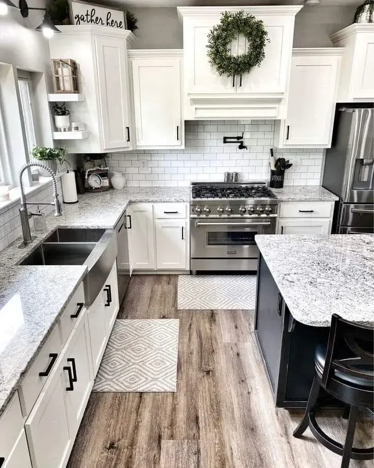 Two people inside a building under construction, examining the interior, the woman pointing at a window.