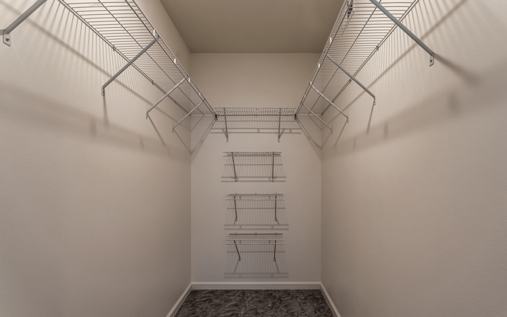Interior of closet with built in shelving