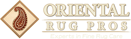 Logo for Oriental Rug Pros featuring a brown paisley design inside a diamond and elegant, beige-colored text.