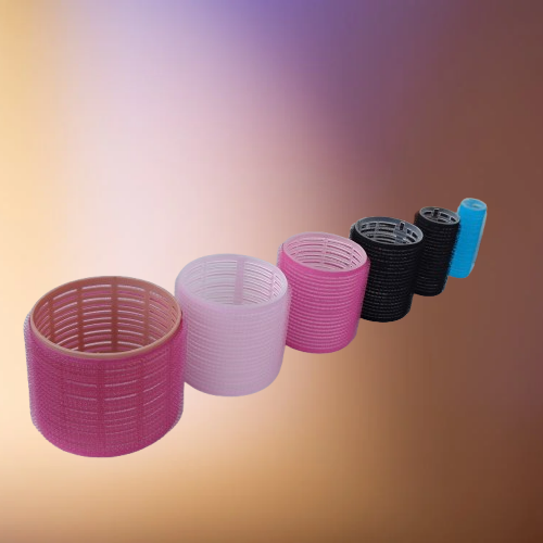 Una hilera de seis rulos de colores ordenados por tamaño, desde el rosa grande hasta el azul pequeño