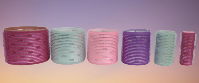 Una hilera de seis rulos de colores, de diferentes tamaños, dispuestos sobre un fondo degradado.