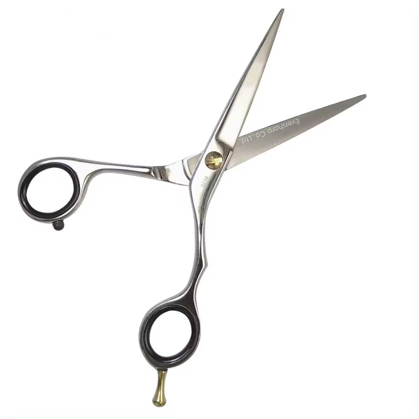 Tijeras de peluquería profesionales plateadas abiertas sobre un fondo blanco con anillos negros para los dedos