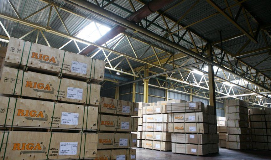 a warehouse full of riga boxes stacked on top of each other