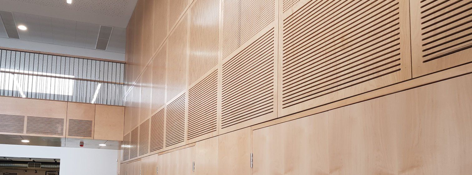 Acoustic plywood panels in a school