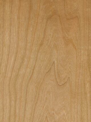 a close up of a piece of wood showing the grain and texture .