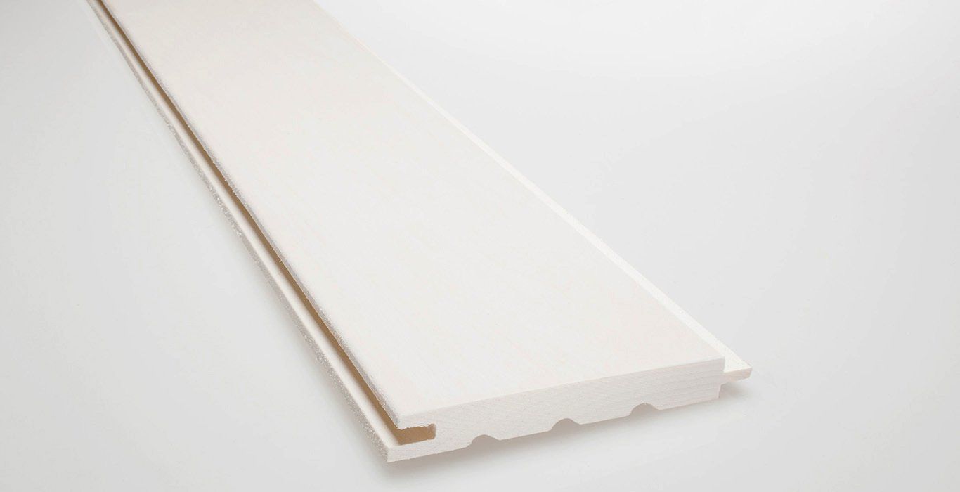 a piece of white wood is sitting on a white surface .