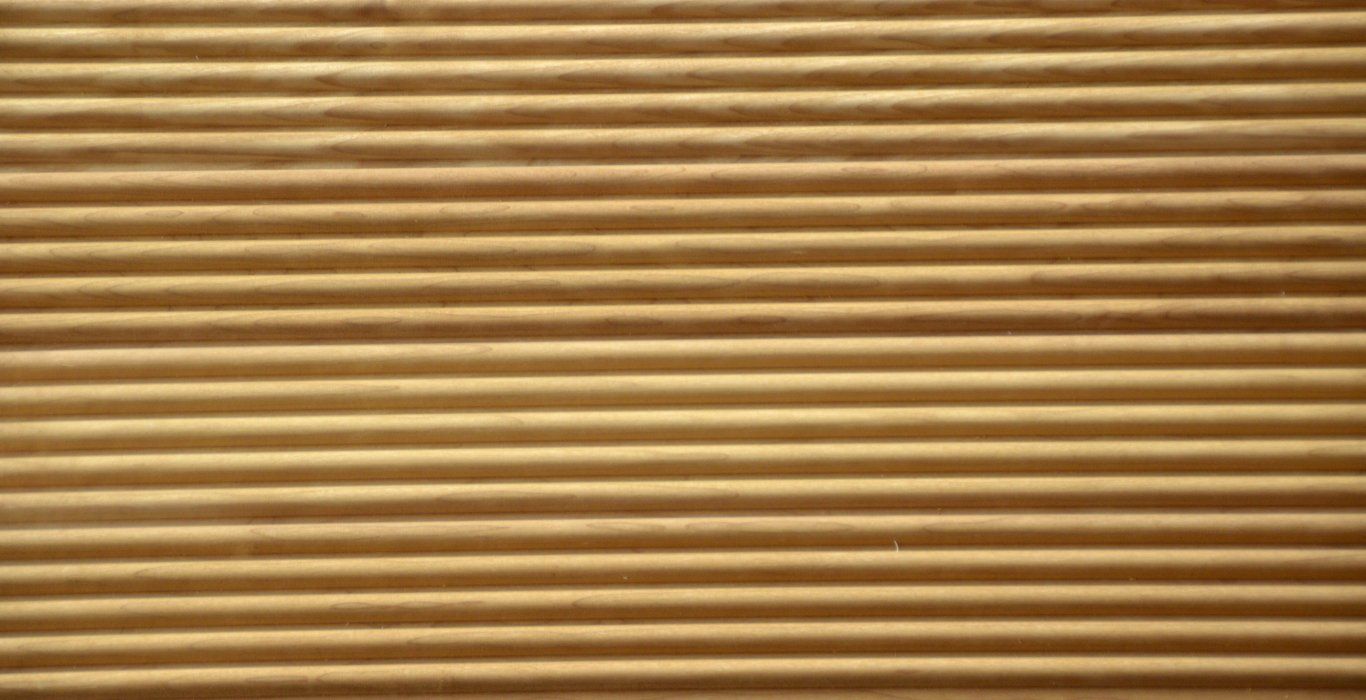 a close up of a piece of corrugated cardboard .