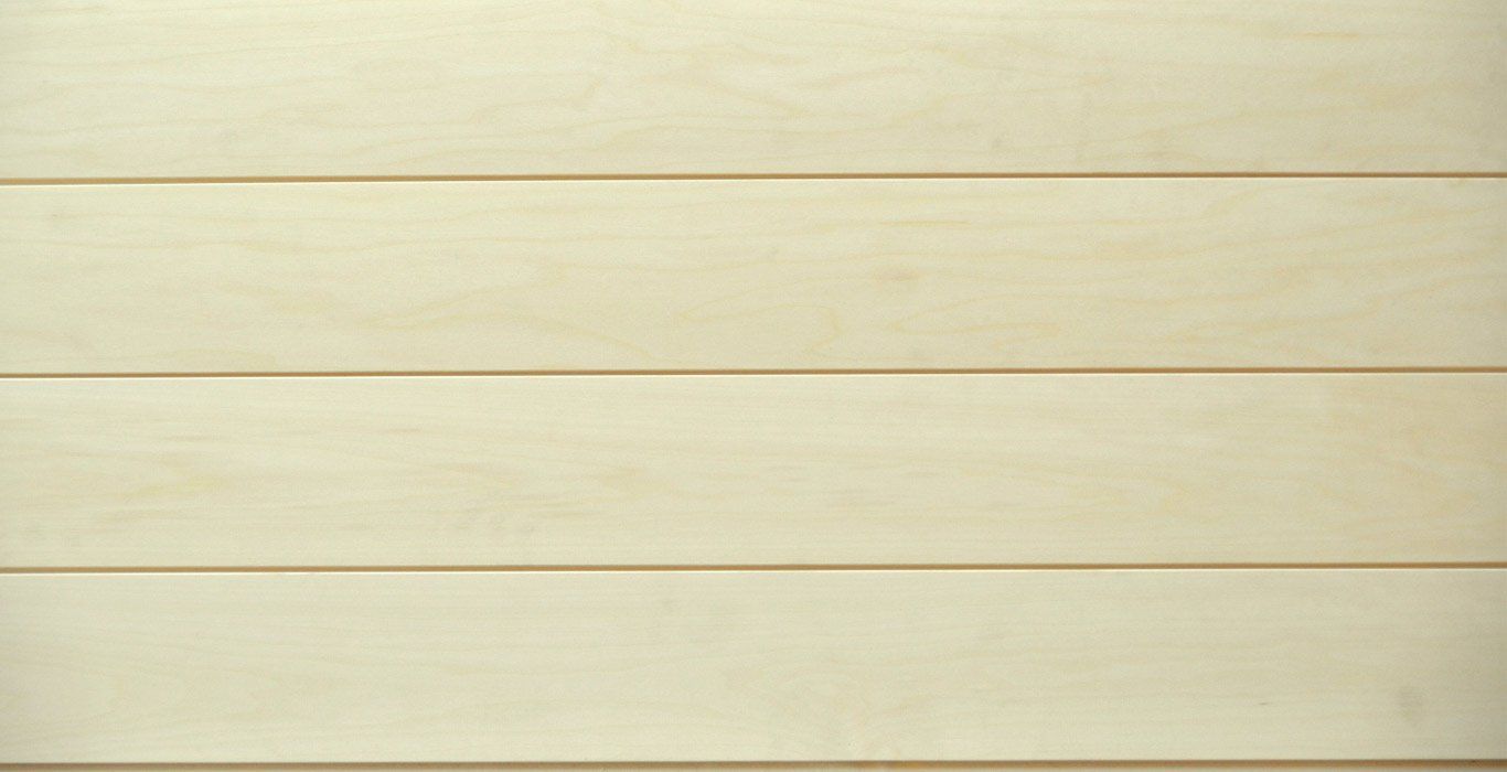 a close up of a white wooden wall with a striped pattern .
