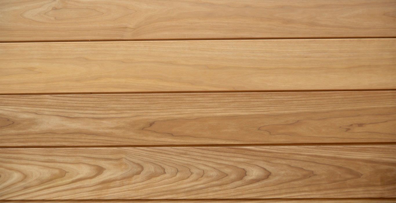 a close up of a wooden surface with a striped pattern .