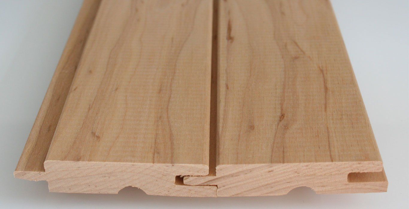 a close up of a piece of wood on a white surface .