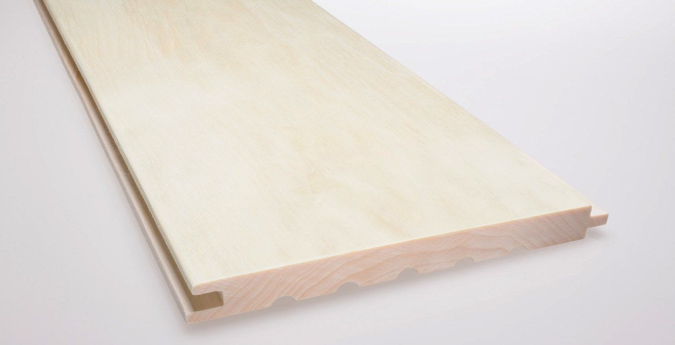 a piece of wood is sitting on a white surface .